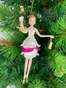 Christbaumschmuck Engel mit goldenem Stern und Tasche in einem pink-weißen Kleid 16 cm