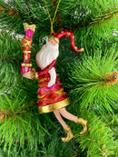 Baumschmuck Weihnachtsmann in einem roten Mantel und Geschenken 15 cm rot-gold Ornament Christbaumschmuck