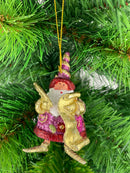 Kleiner Weihnachtsmann mit Feder und Schriftrolle lila gold Deko Hänger handbemalt Weihnachten Christbaumschmuck 8 cm