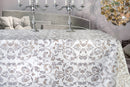 Wachstuchtischdecke "Livia" Ranken in grau-gold auf perlmutt-weißem Untergrund 1,4m Breite Länge wählbar